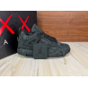 KAWS & Air Jordan 4 Retro 'Black'